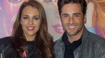 Paula Echevarría y David Bustamante disfrutan a duras penas del concierto de 'Violetta' en Madrid