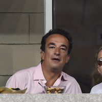 Olivier Sarkozy y Mary-Kate Olsen viendo un partido del US Open