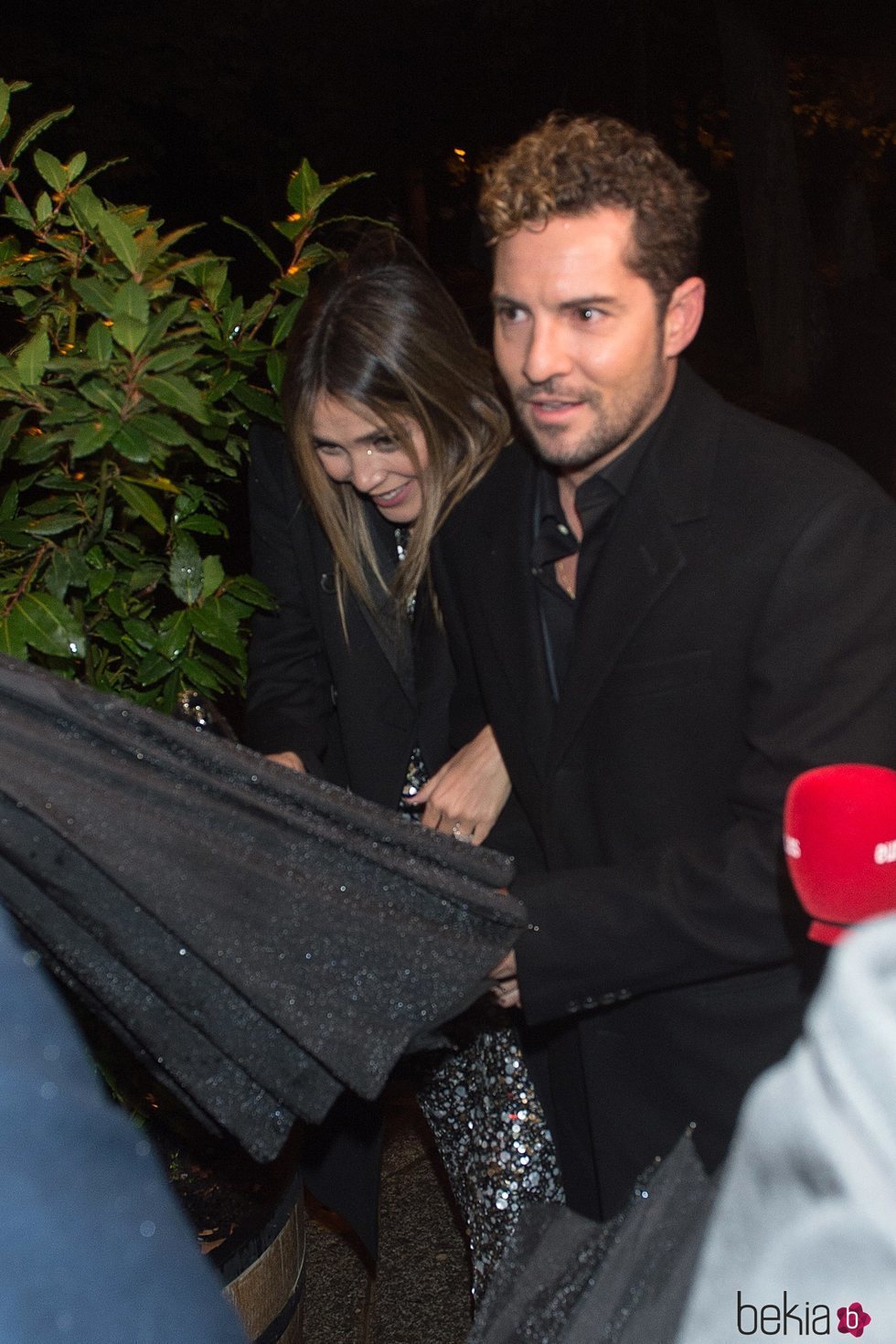 Rosanna Zanetti y David Bisbal a su llegada a una fiesta de 'Arde Madrid'