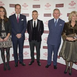 Los Duques de Cambridge, Gary Barlow, Carlos de Inglaterra y Camilla de Cornualles