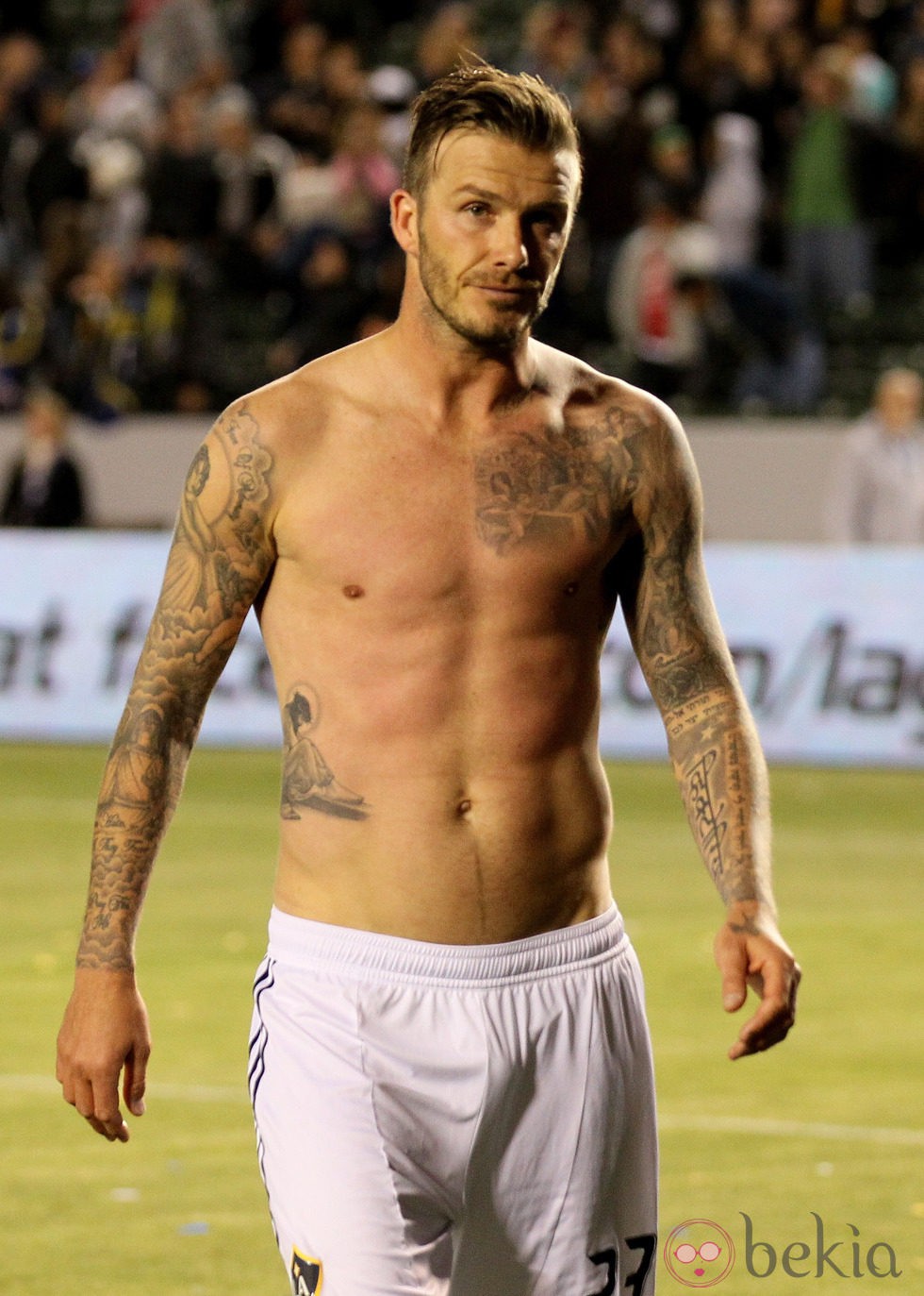 David Beckham luce sus tatuajes