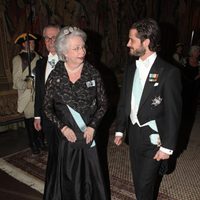 La Princesa Cristina y el Príncipe Carlos Felipe en la cena al gala al presidente de Turquía