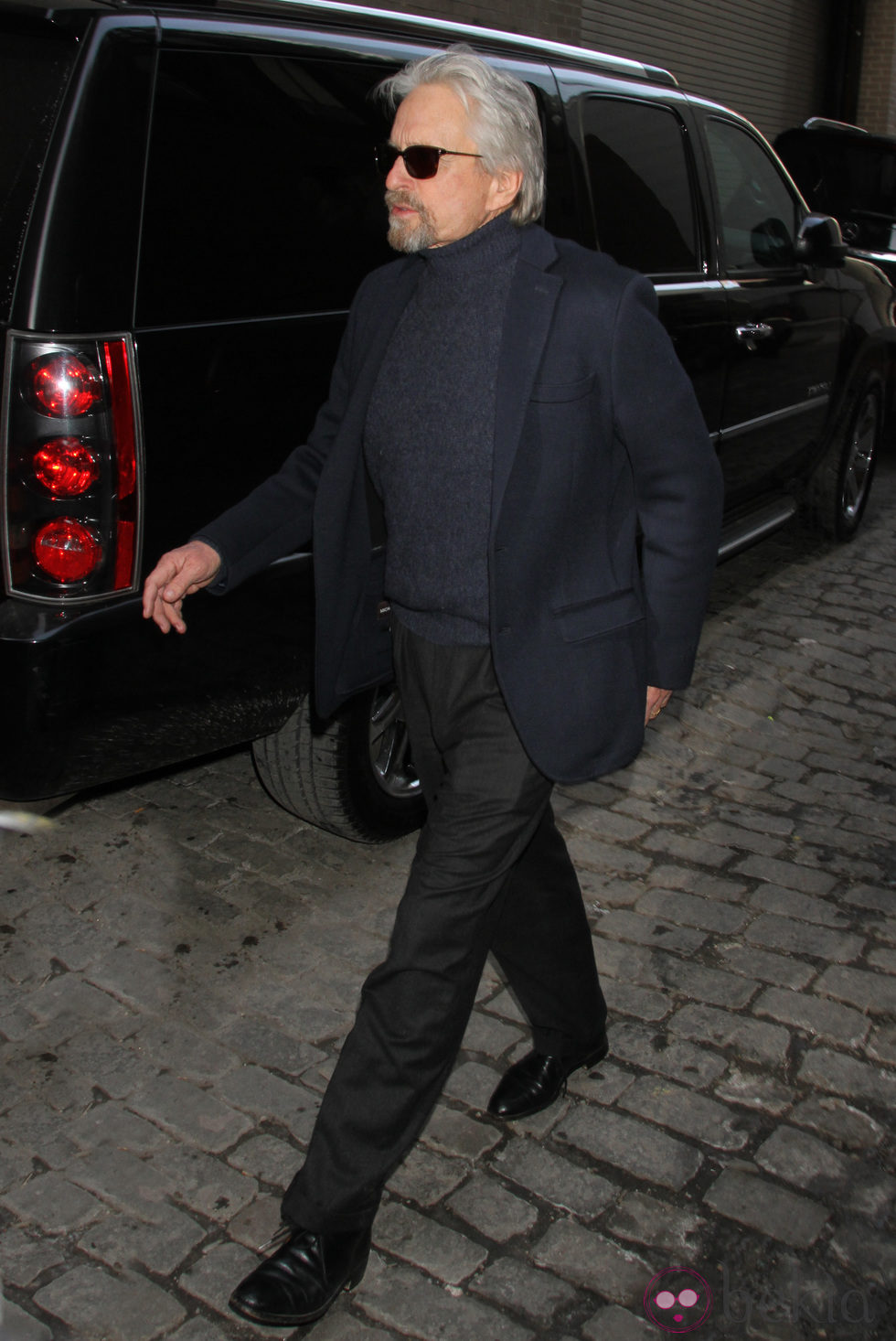 Michael Douglas en el desfile de Michael Kors en la Semana de la Moda de Nueva York 2014